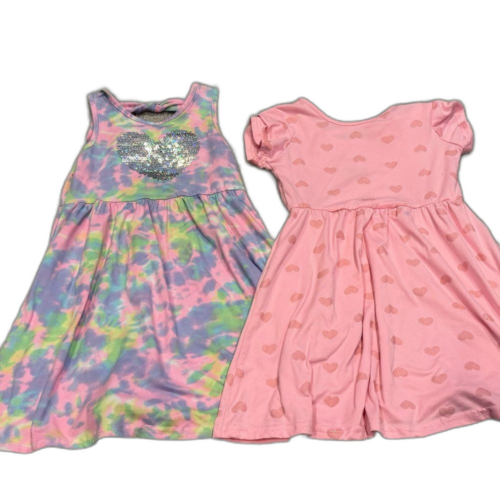 Two Freestyle revolution dresses Size 4